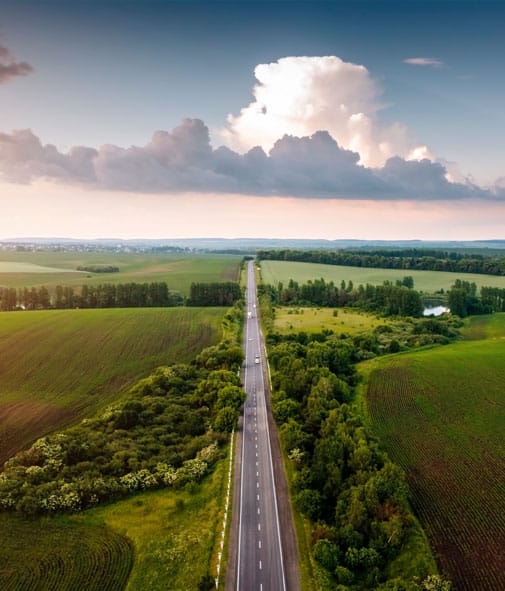 Aerial view of land near a highway